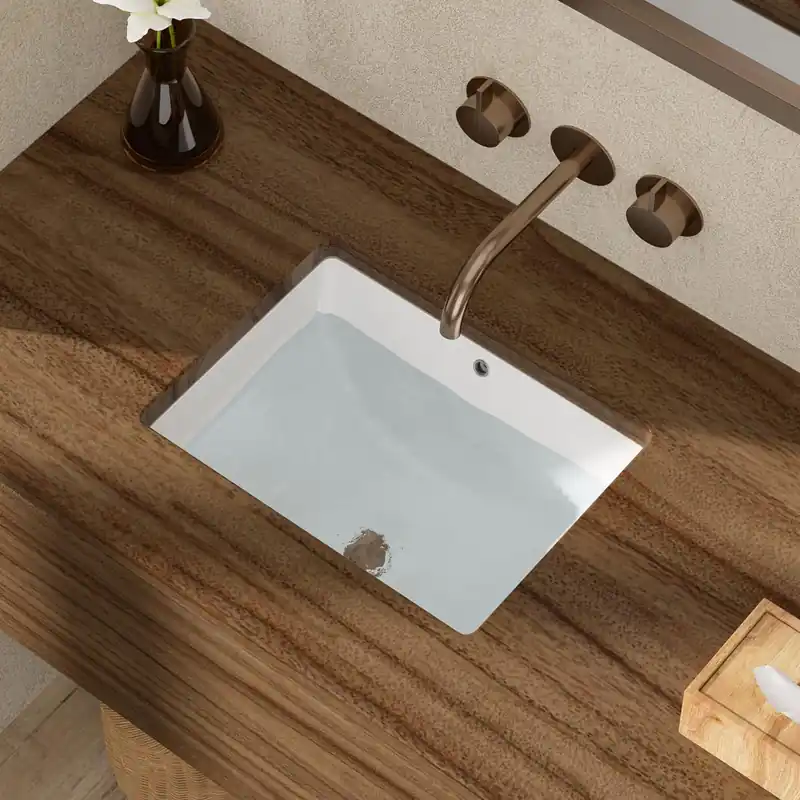Couoko Undermount Bathroom Sink 18x14 Inch White Rectangle Porcelain Vessel Sinks with Curves Bottom Deep Basin with Overflow Lavatory Vanity Sink Mounted Under the Counter