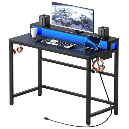 Small Computer Desk with Charging Station and LED Lights, Gaming Desk with Monitor Stand, 2-Tier Home Office Desk, Black