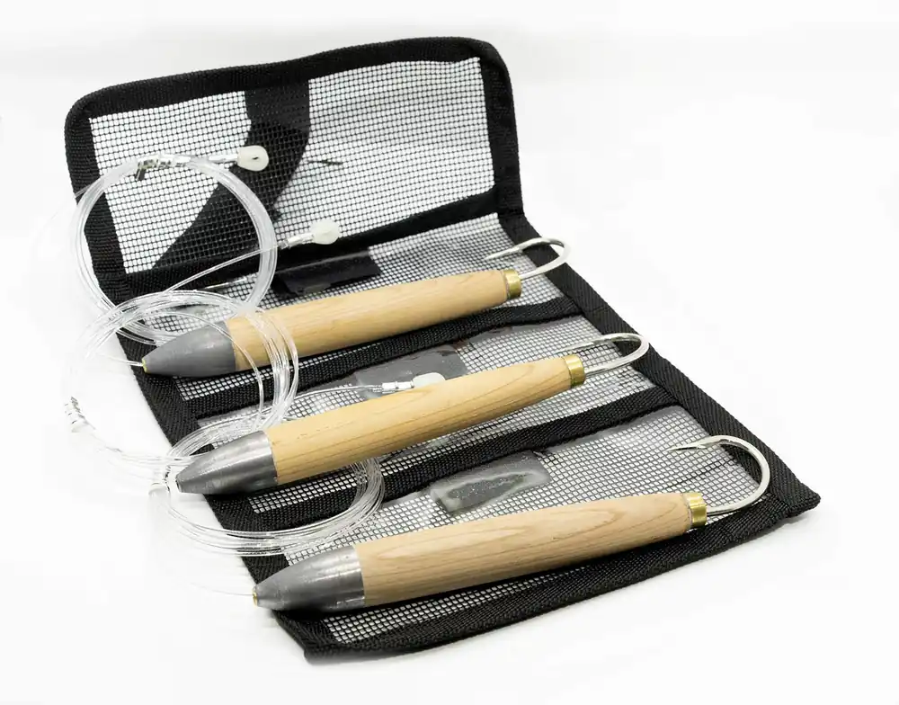 Set of 3 Cedar Plug trolling Fishing Lures 6 inch Natural Cedar Fully Rigged with 150 Lb Mono! Packaged in Black MESH Bag! Ready to be fished Out of the Packaging